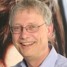 headshot of Oliver John