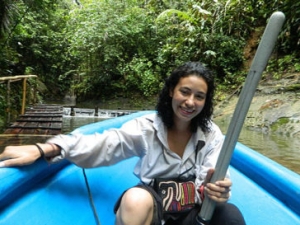 Valeria Ramírez-Castañeda in a boat in the Colombian jungle